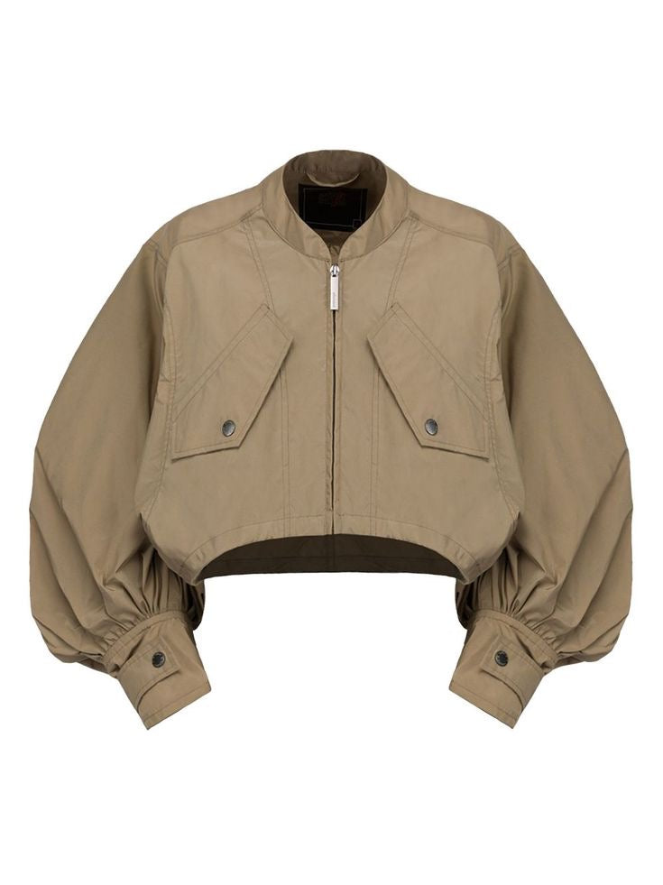 Veste courte beige à manches bouffantes